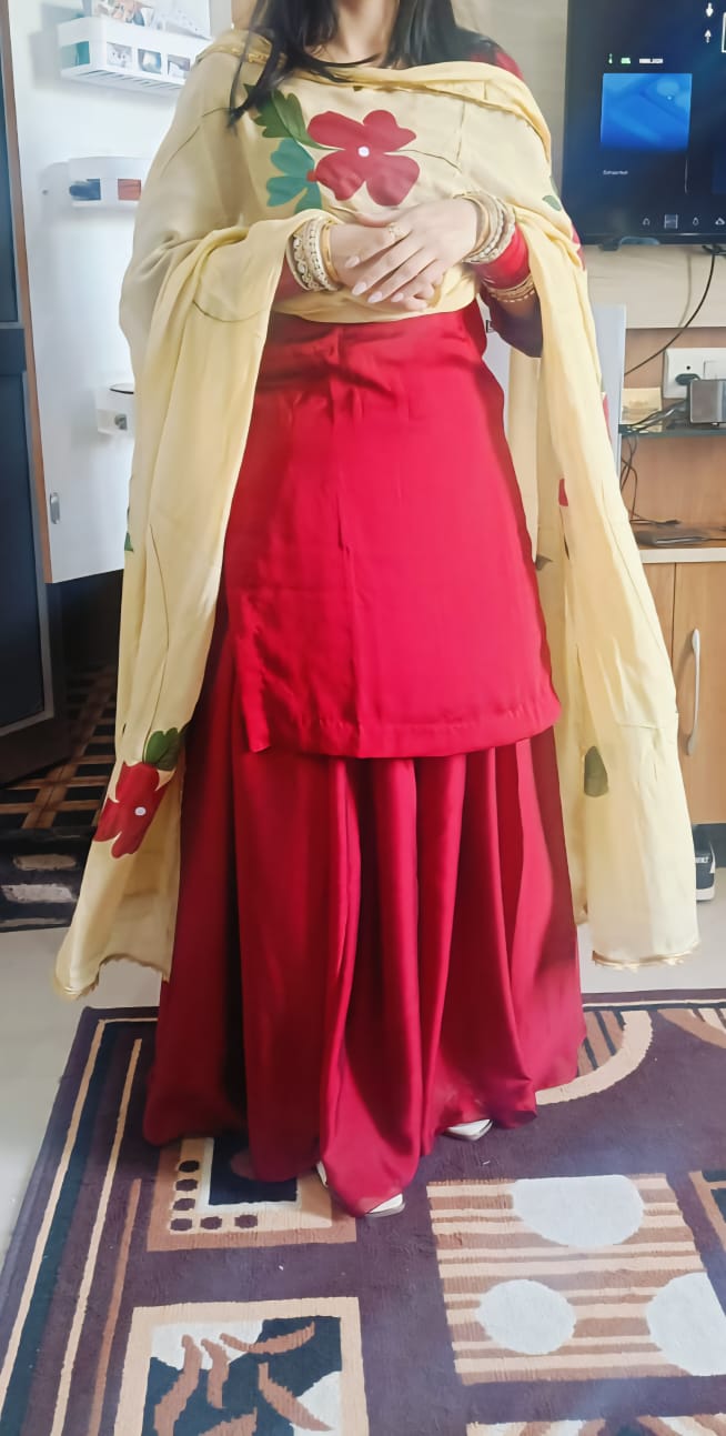 Red shrara suit with hand painted dupatta